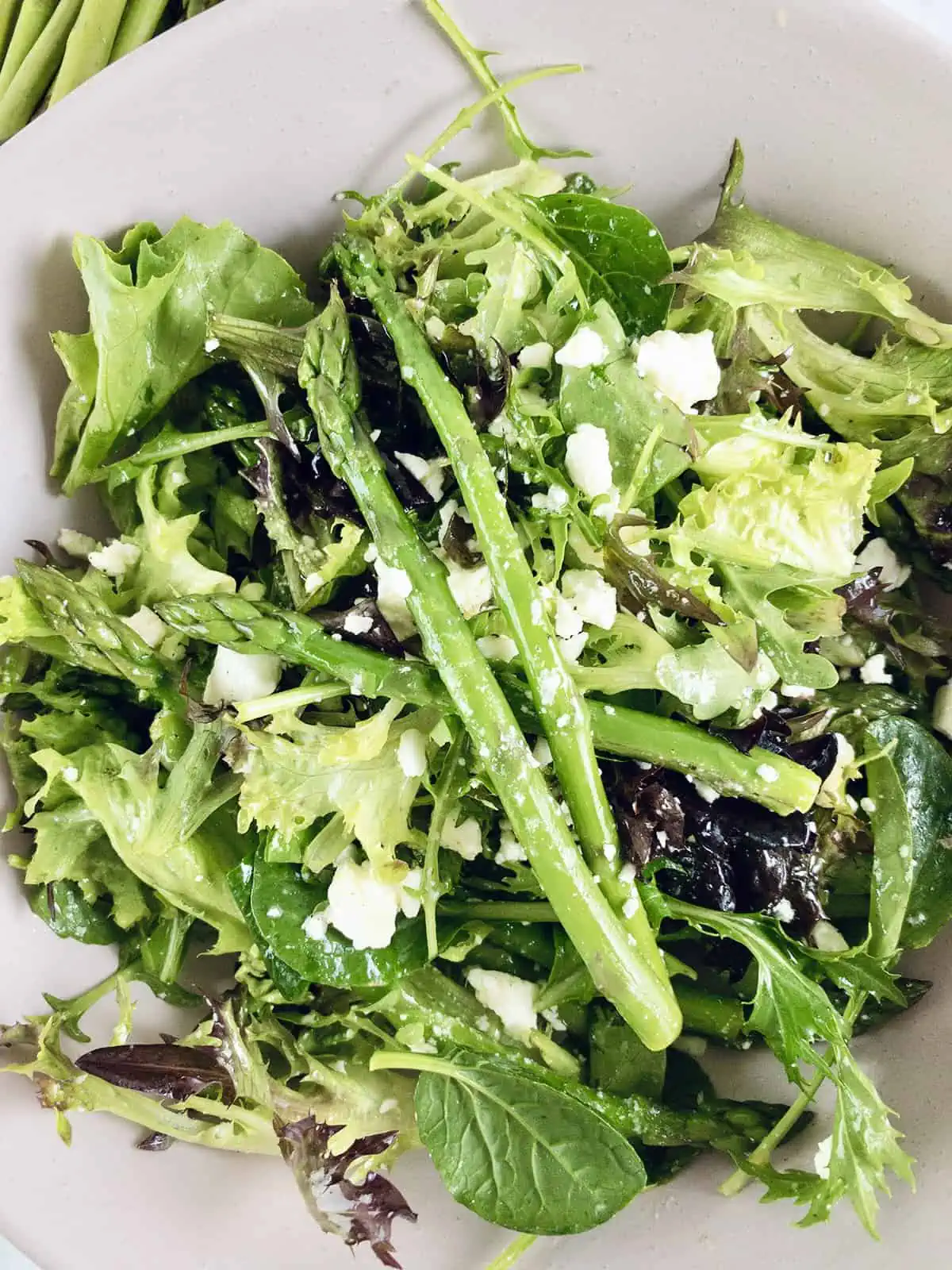 A Close-Up of Blanched Asparagus and Feta Salad.