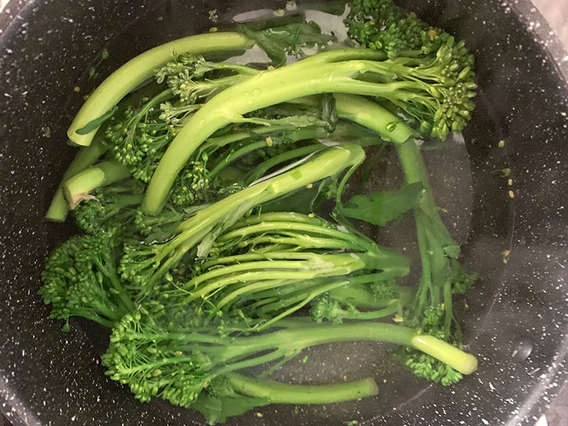 BROCCOLINI IN BOILING SALTED WATER UNTIL IT BECOMES TENDER