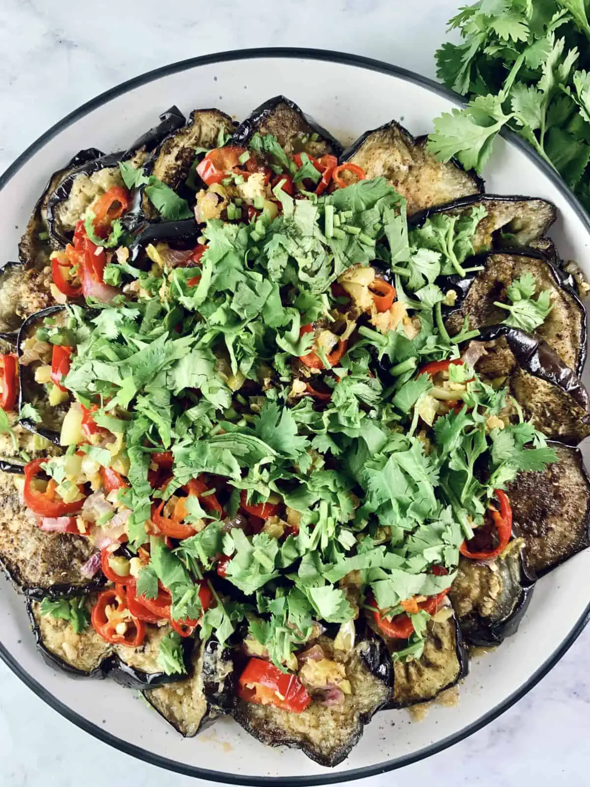 Chinese Eggplant Salad with coriander on the side.