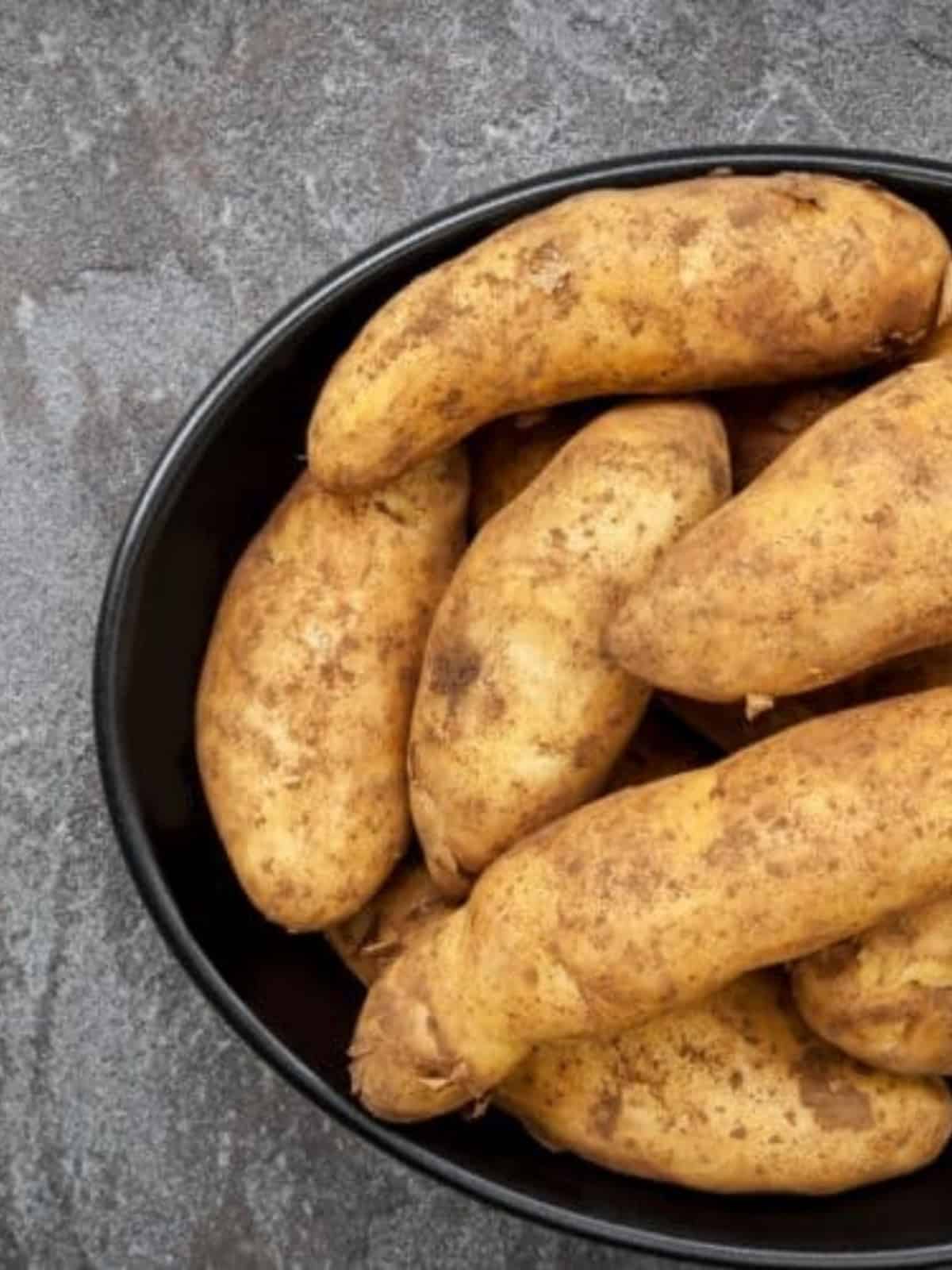 kipfler potatoes in black bowl
