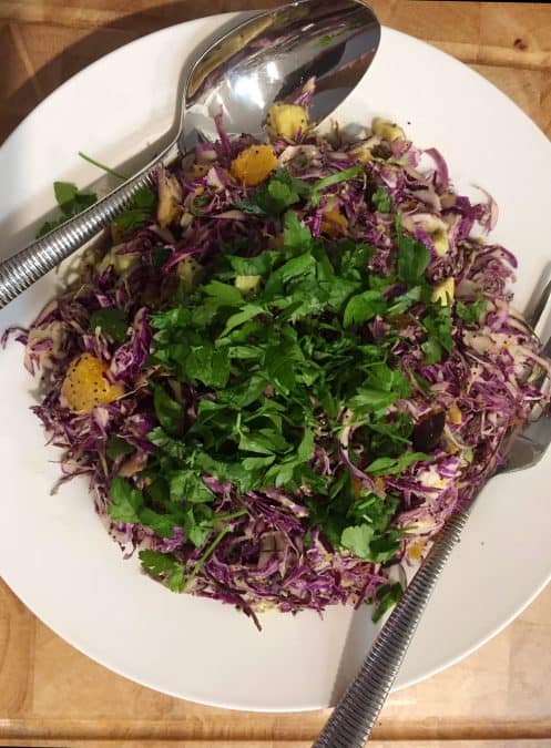 SHAVED PURPLE BRUSSELS SPROUTS SALAD WITH ORANGE AND POPPYSEEDS AND PARSLEY ON TOP