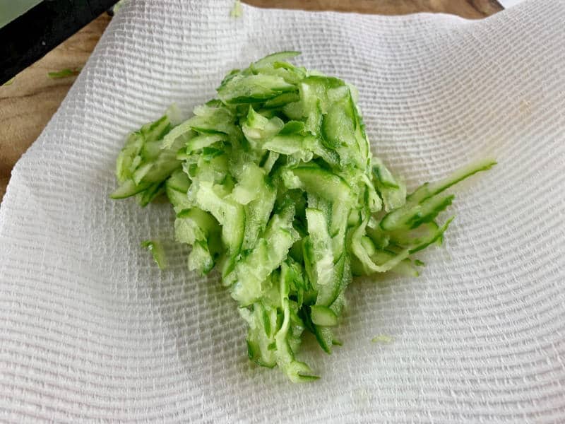PLACE GRATED CUCUMBER ON PAPER TOWEL