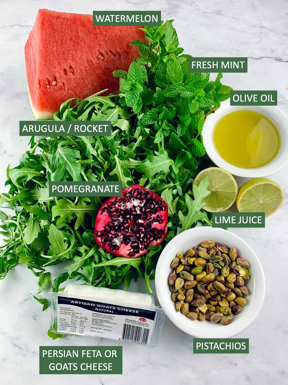 Labelled ingredients needed to make a watermelon feta salad.