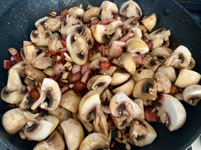 COOK MUSHROOMS WITH BACON MIX UNTIL SLIGHTLY SOFT