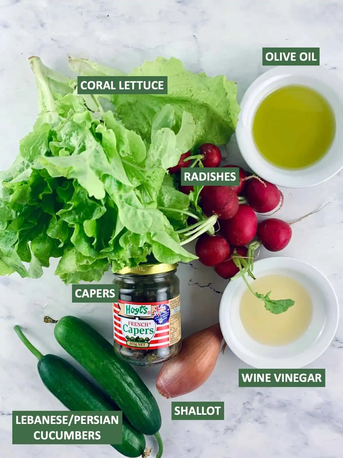 Labelled ingredients needed to make a radish green salad.