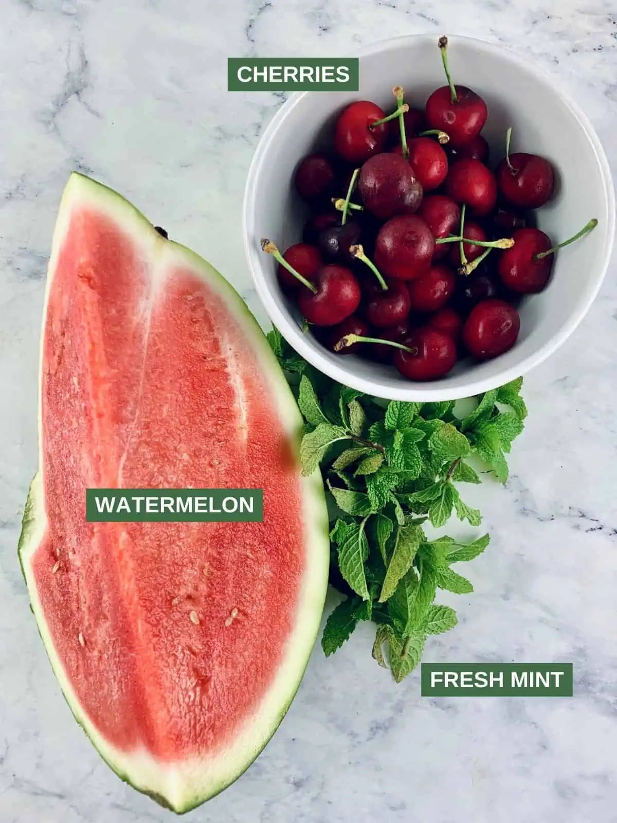 Labelled ingredients needed to make watermelon fruit salad.