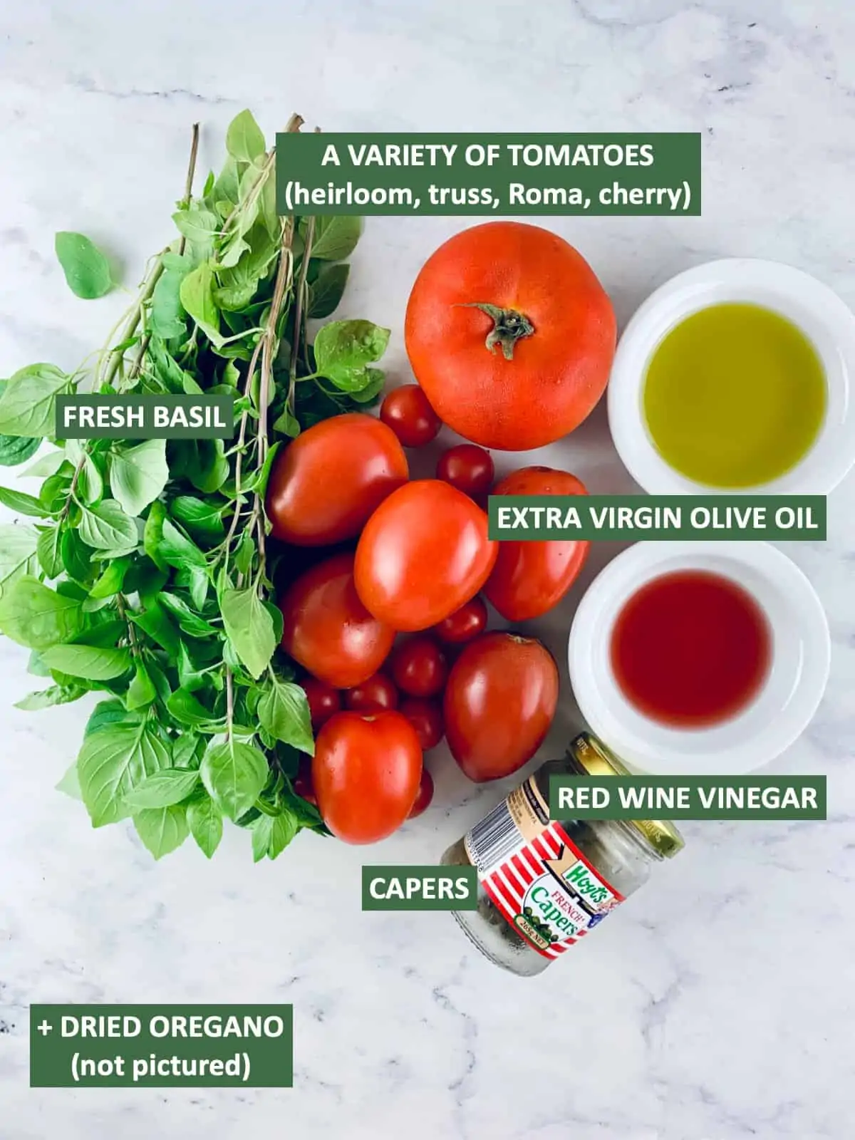Labelled ingredients needed to make Italian tomato salad.