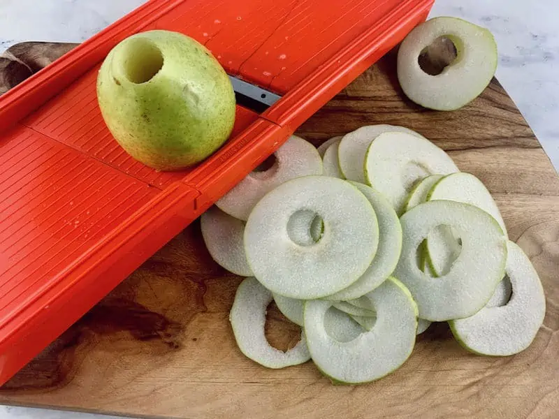 THINLY SLICING CORED PEARS ON MANDOLINE SLICER