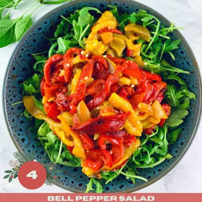 Bell Pepper Salad in a dark grey patterned bowl with a xmas text overlay.
