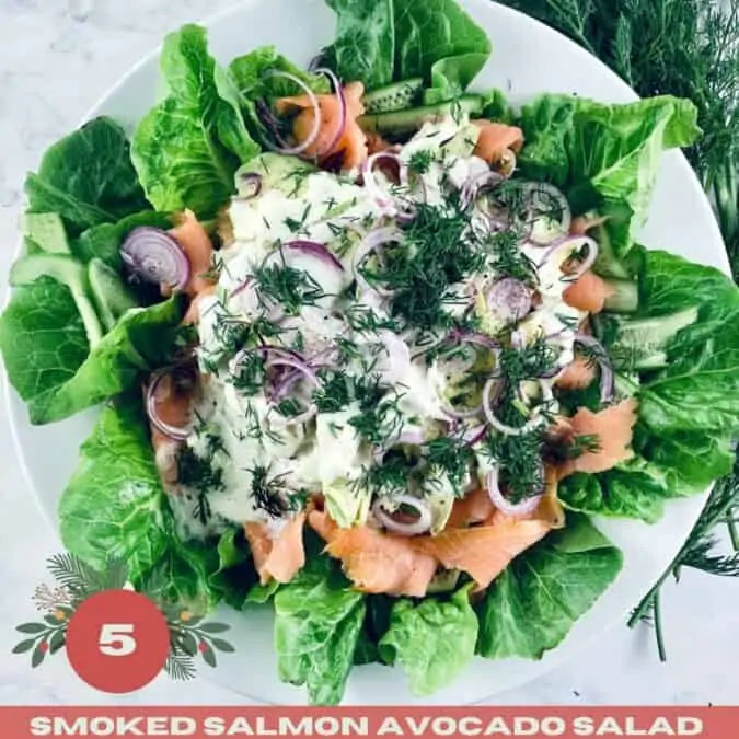 Smoked Salmon Avocado Salad on a white platter with fresh dill on top right corner and a Xmas text overlay.
