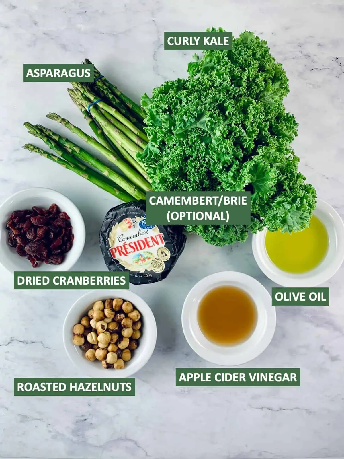 Labelled ingredients needed to make Kale and Cranberry salad.
