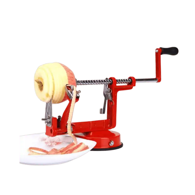 A red mechanical hand crank peeler that is peeling a red apple.