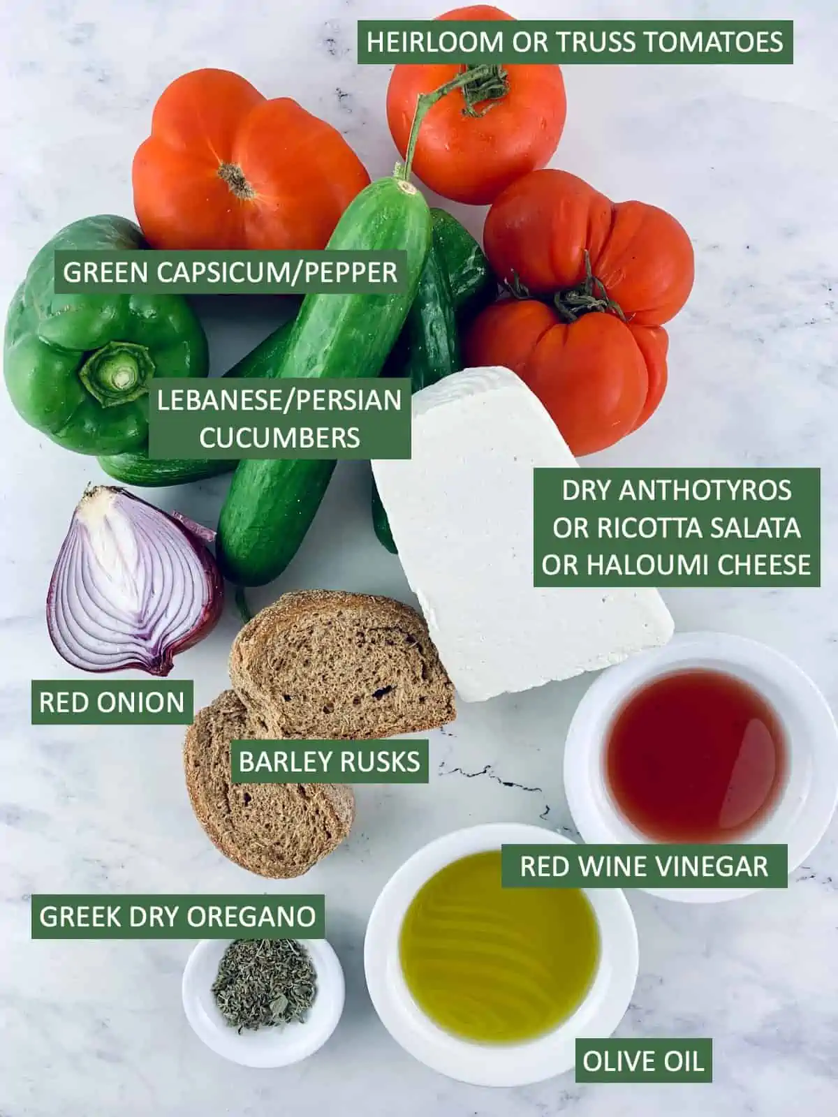 Labelled ingredients needed to make Cretan salad.