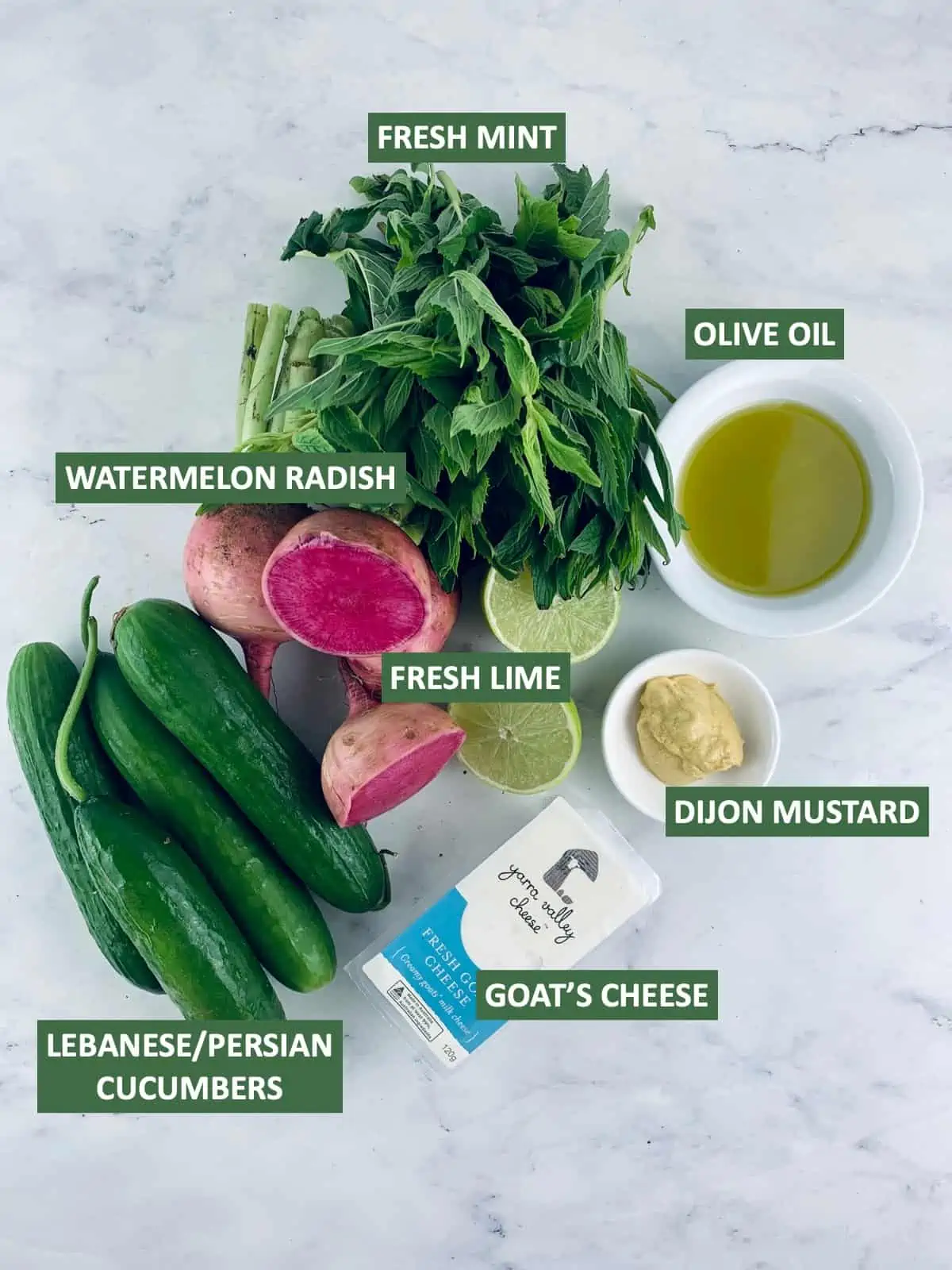 Labelled ingredients needed to make cucumber goat cheese salad.