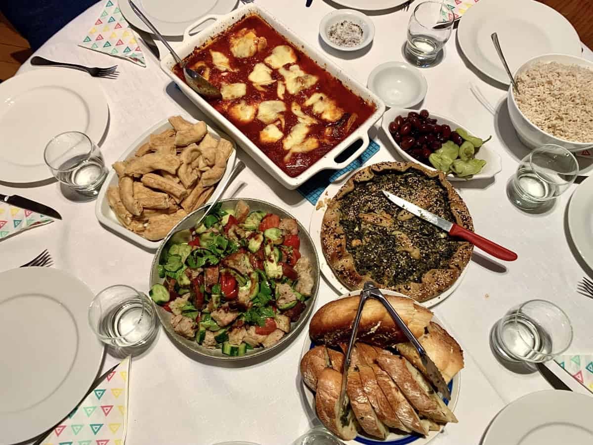 Aerial view of a set table with a variety of dishes.