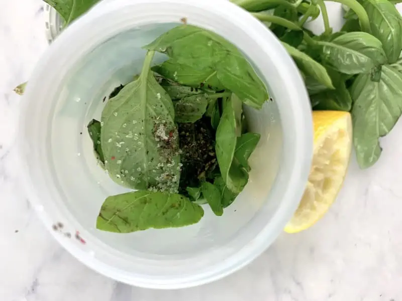 Add lemon basil dressing ingredients to a blender.