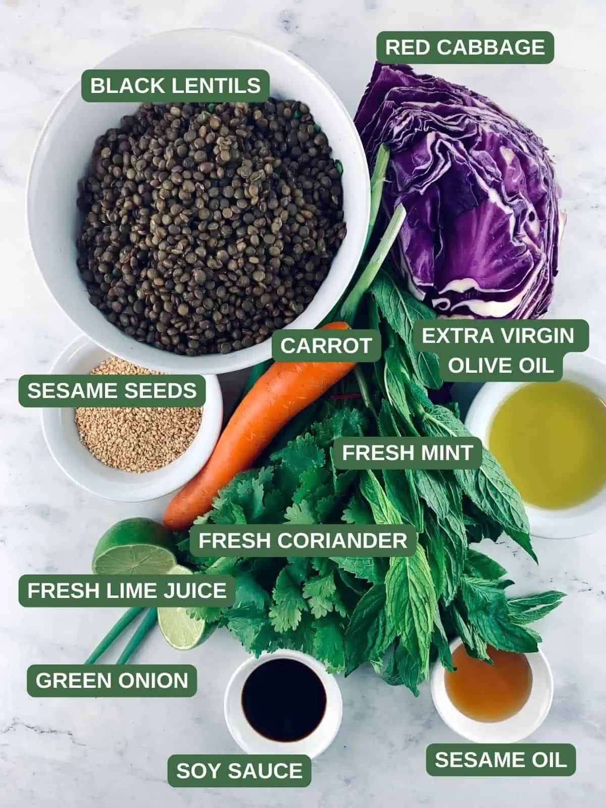 Labelled ingredients needed to make a black lentil salad.