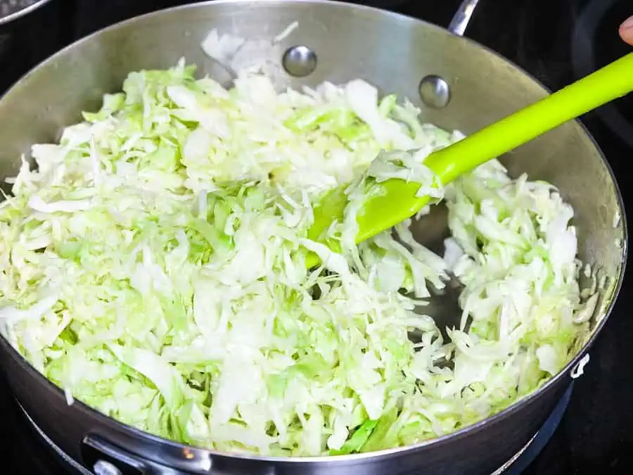Sautéing Cabbage in a pan.