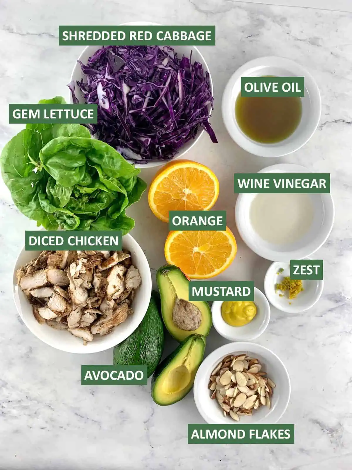Labelled ingredients needed to make a harvest chicken salad.