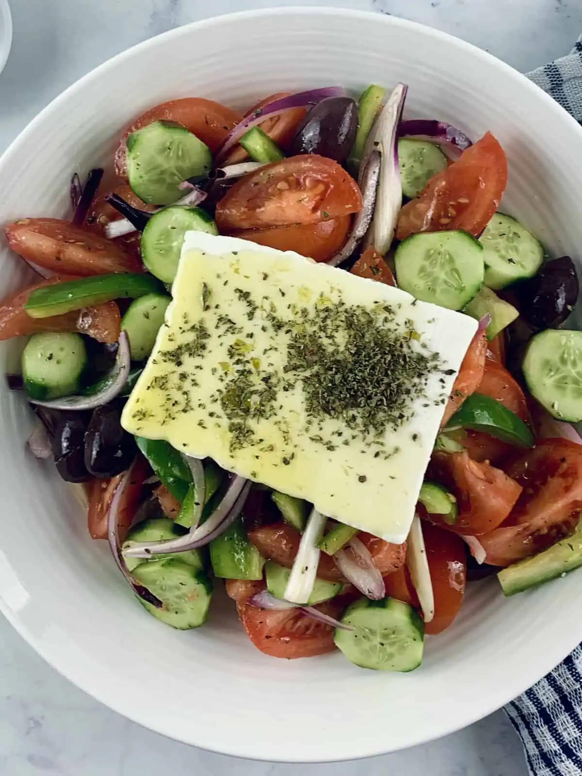 Labelled ingredients needed to make a Horiatiki Salad.