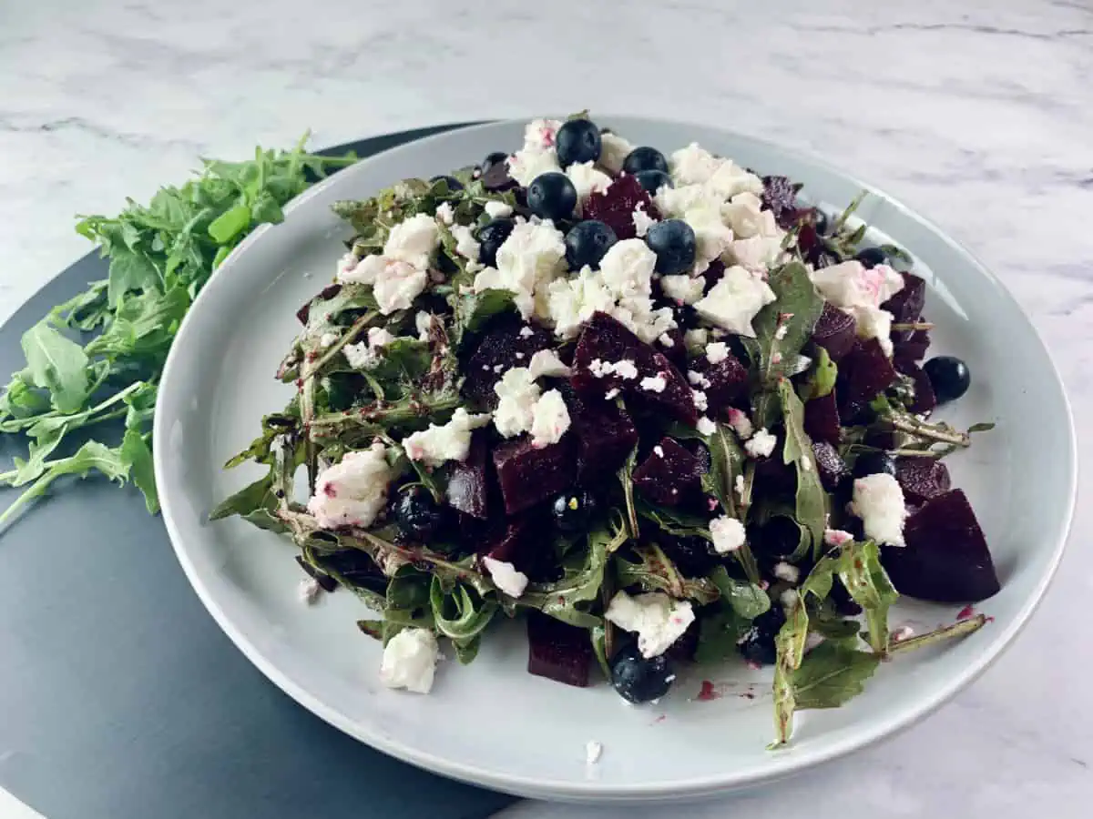 Red white and blue salad with beets, blueberries, arugula and feta.