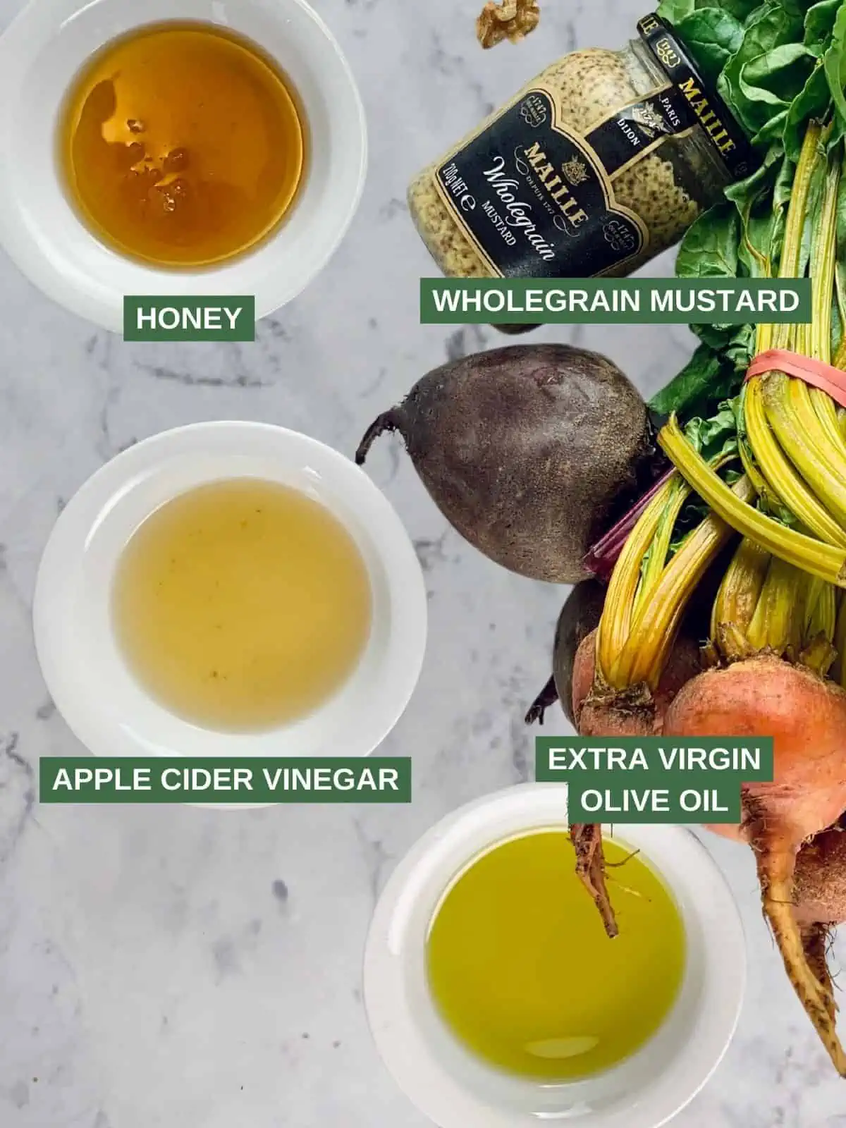 Labelled ingredients needed to make honey mustard vinaigrette.